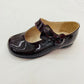 Zapato de charol vino