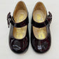 Zapato de charol vino