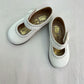 Zapato blanco con broche